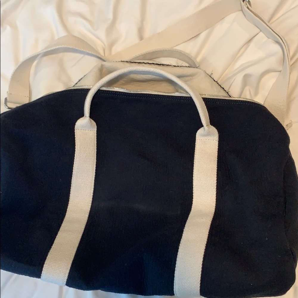 Brandy Melville navy blue travel bag